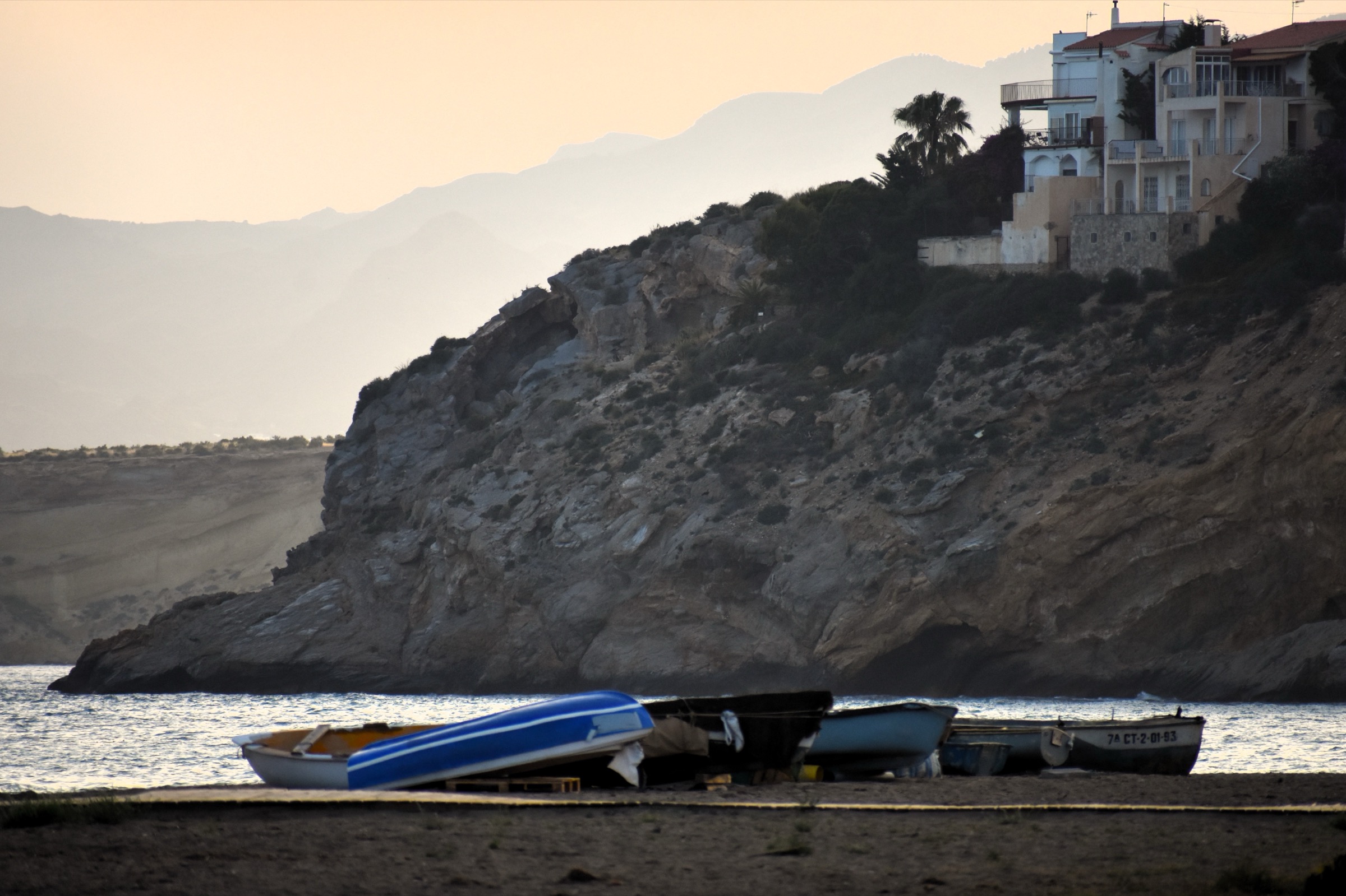 Fishing boats on the beach at Bolnuevo at dusk