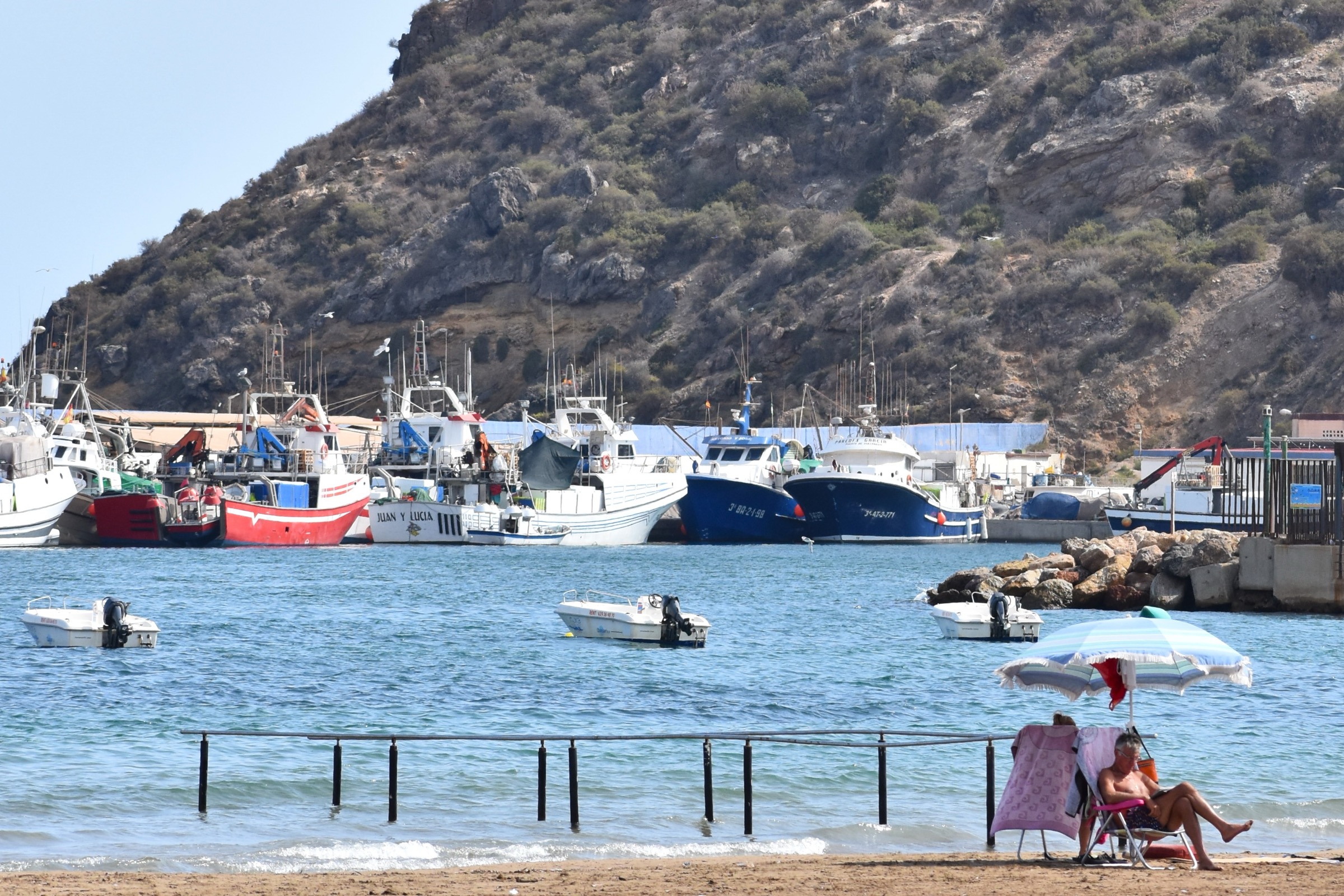 The beach and fishing harbour at Puerto de Mazarrón