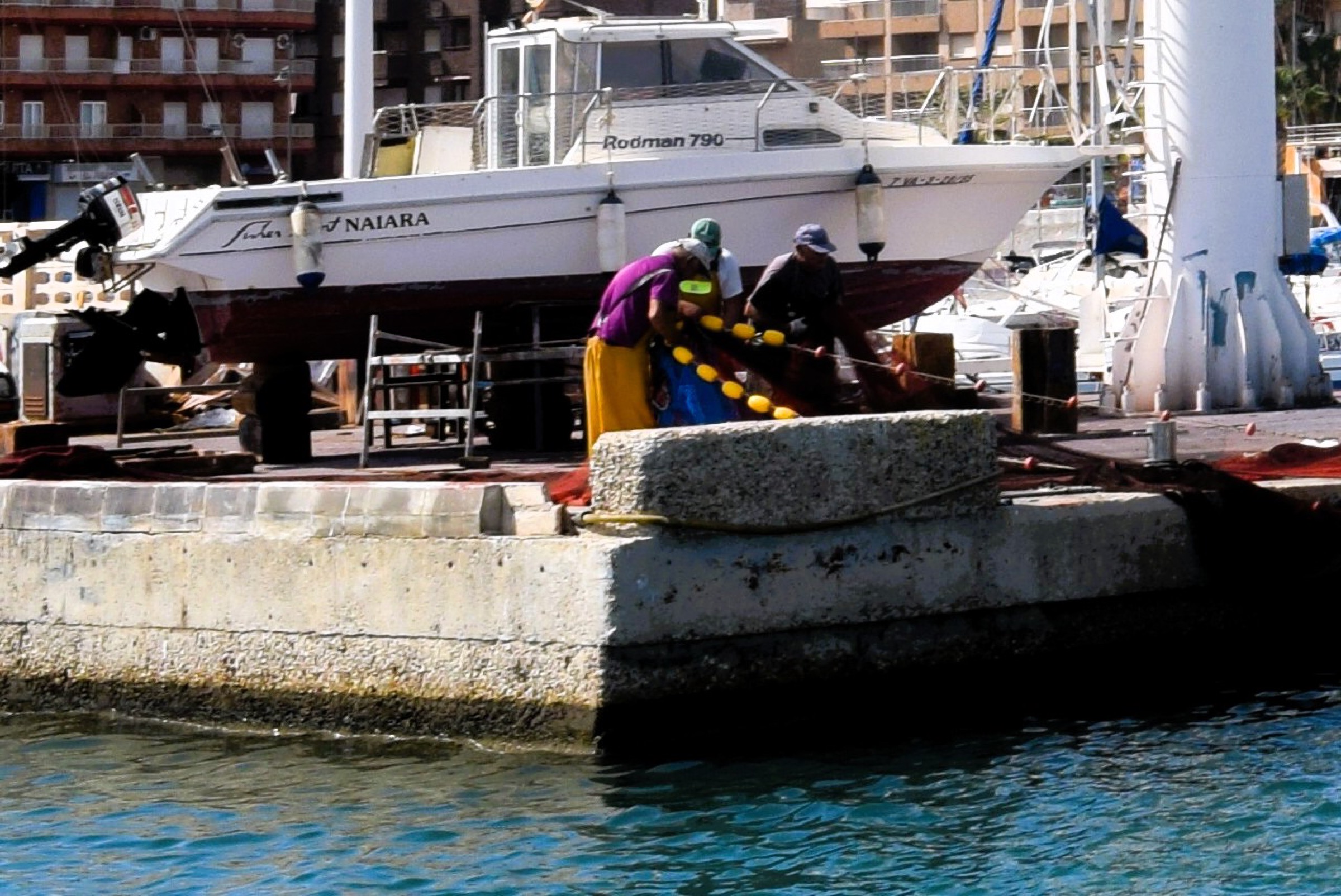 Fishermen checking their nets at Puerto de Mazarrón