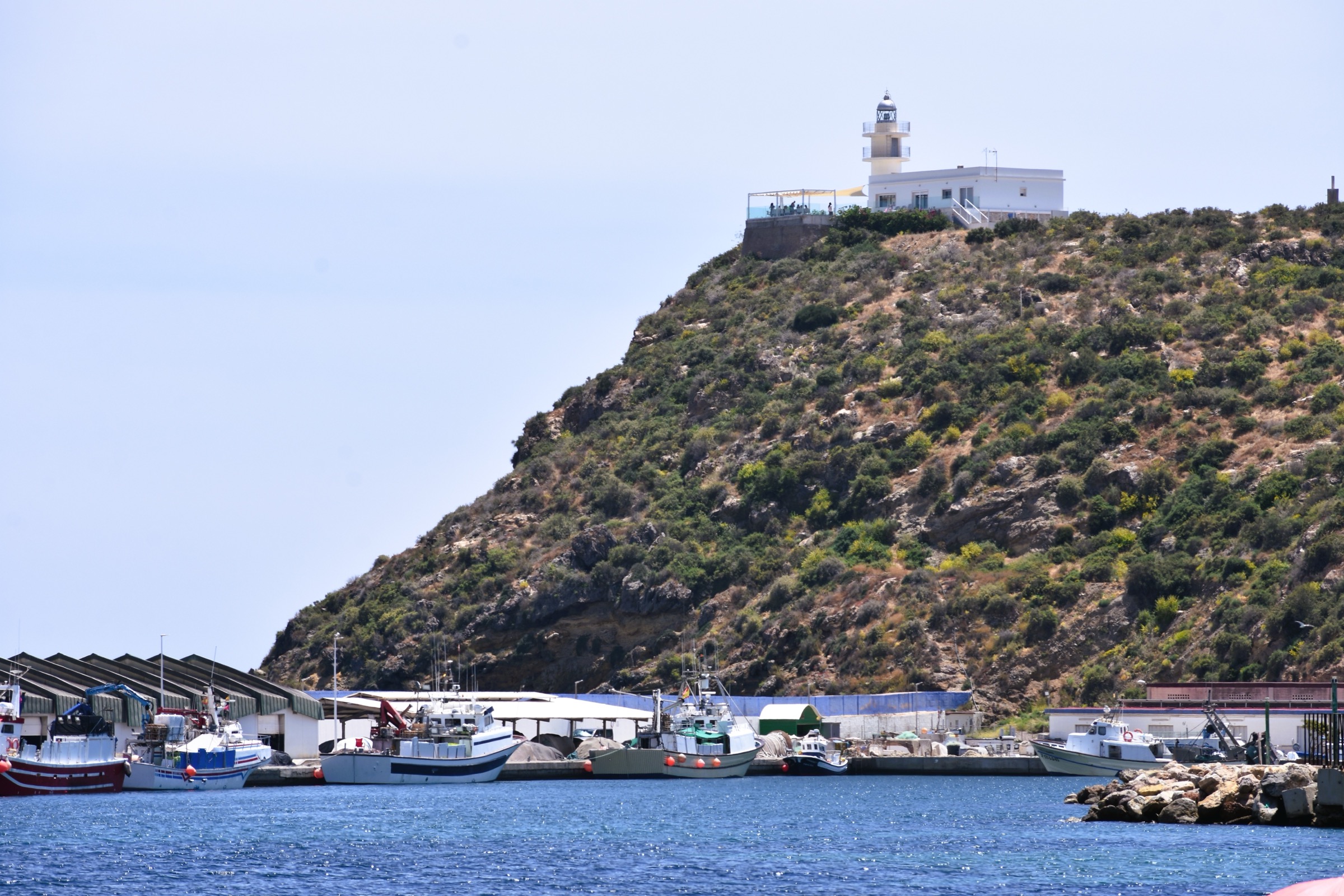 The fishing harbour below the lighthouse headland at Puerto de Mazarrón