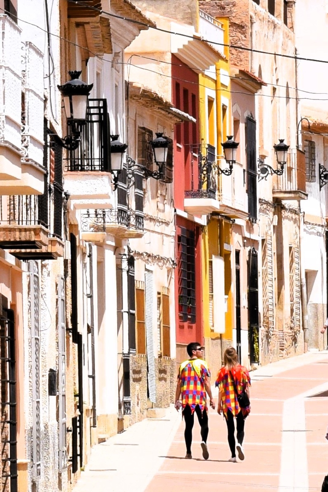 A colourful street in Alhama de Murcia during the Fiestas de Los Mayos