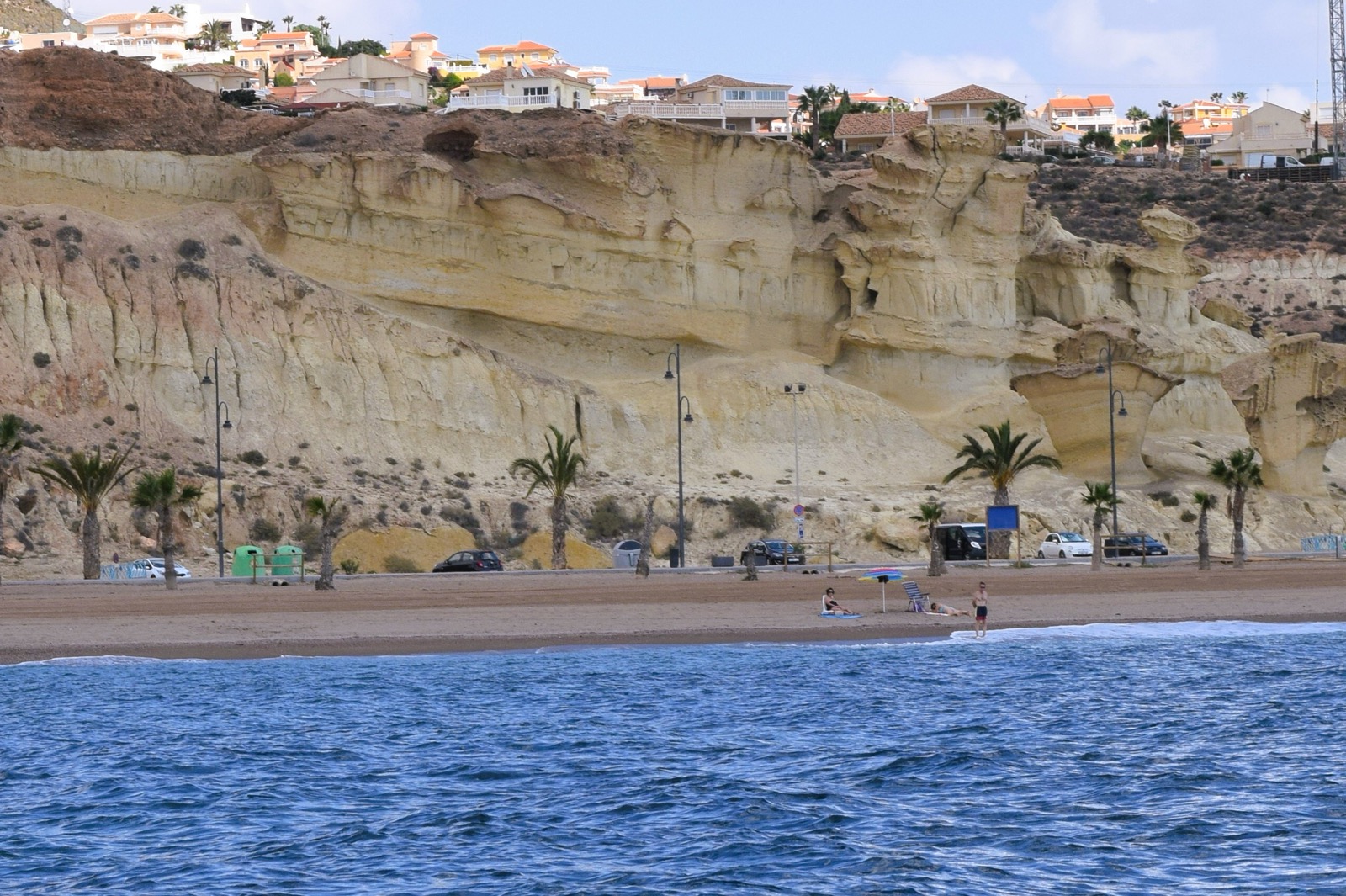 The eroded Gredas sandstone cliffs at Bolnuevo beach, viewed from the sea