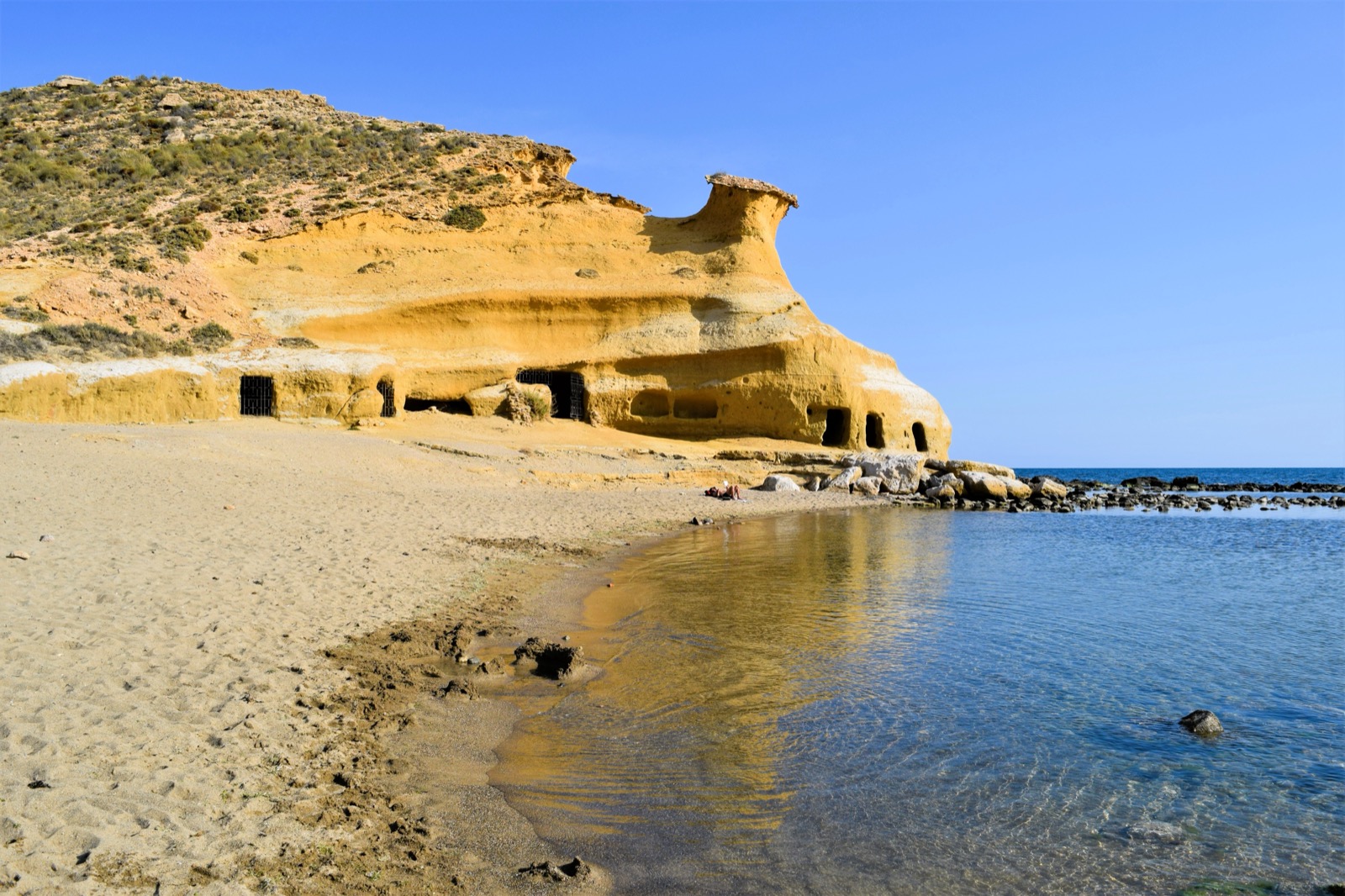 Playa de los Cocedores, Águilas, with its carved sandstone caves