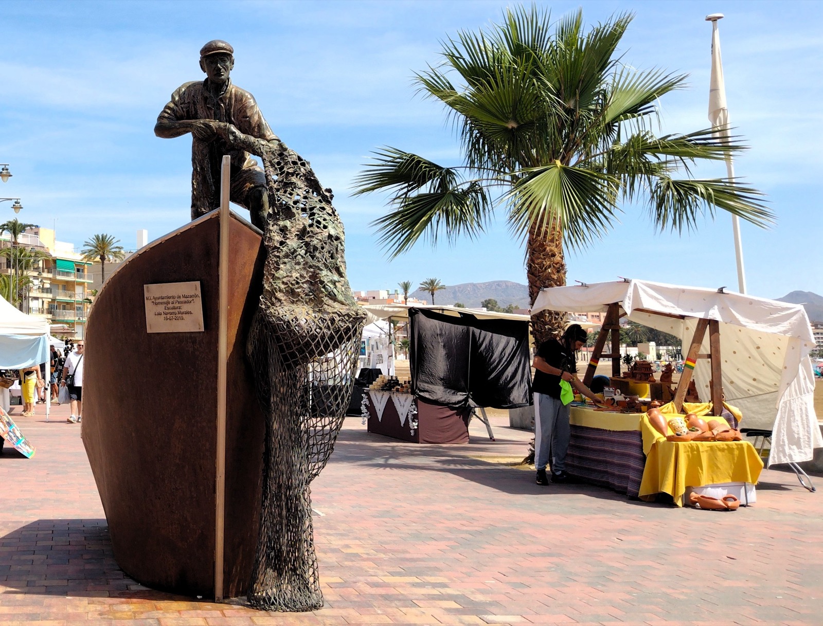 The Homenaje al Pescador fisherman statue on the Puerto de Mazarron seafront