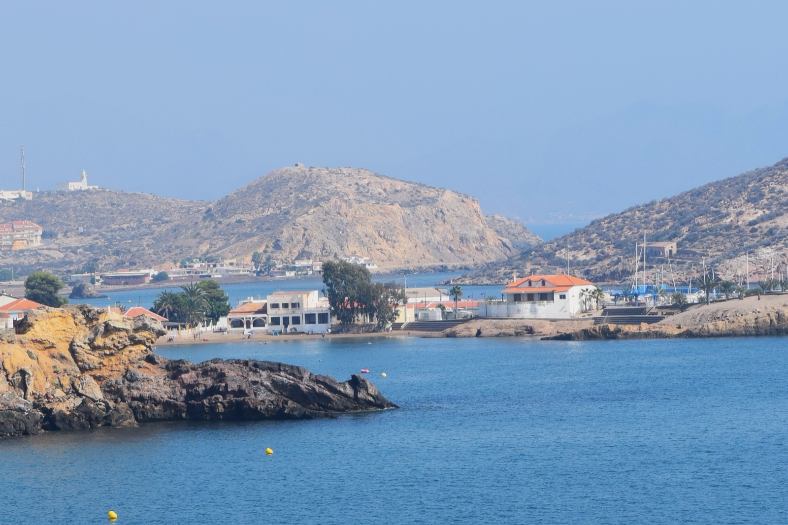 The rocky coast and lighthouse at Puerto de Mazarron
