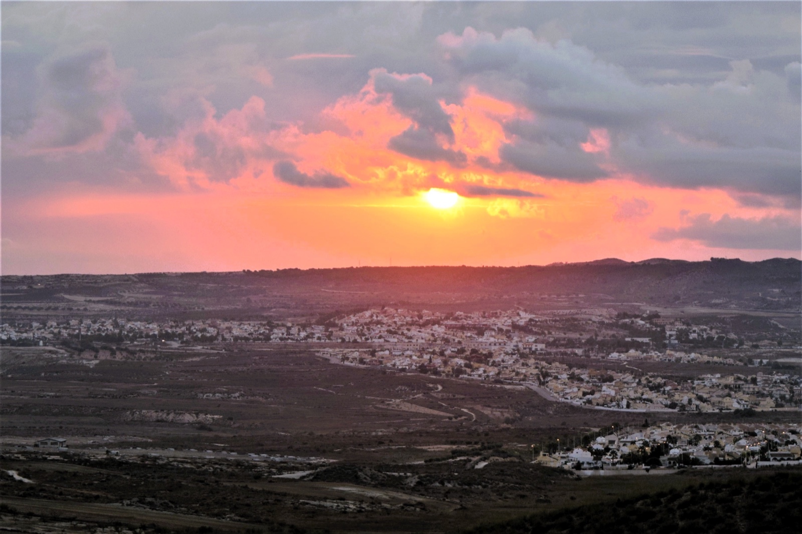 Sunset over Camposol seen from the reservoir above D sector