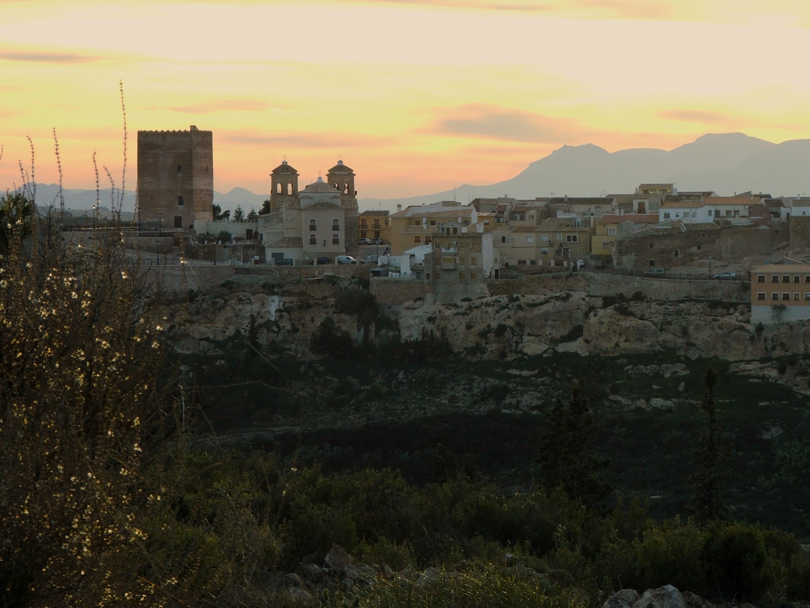 The town of Aledo with its castle tower at sunset, Sierra Espuna