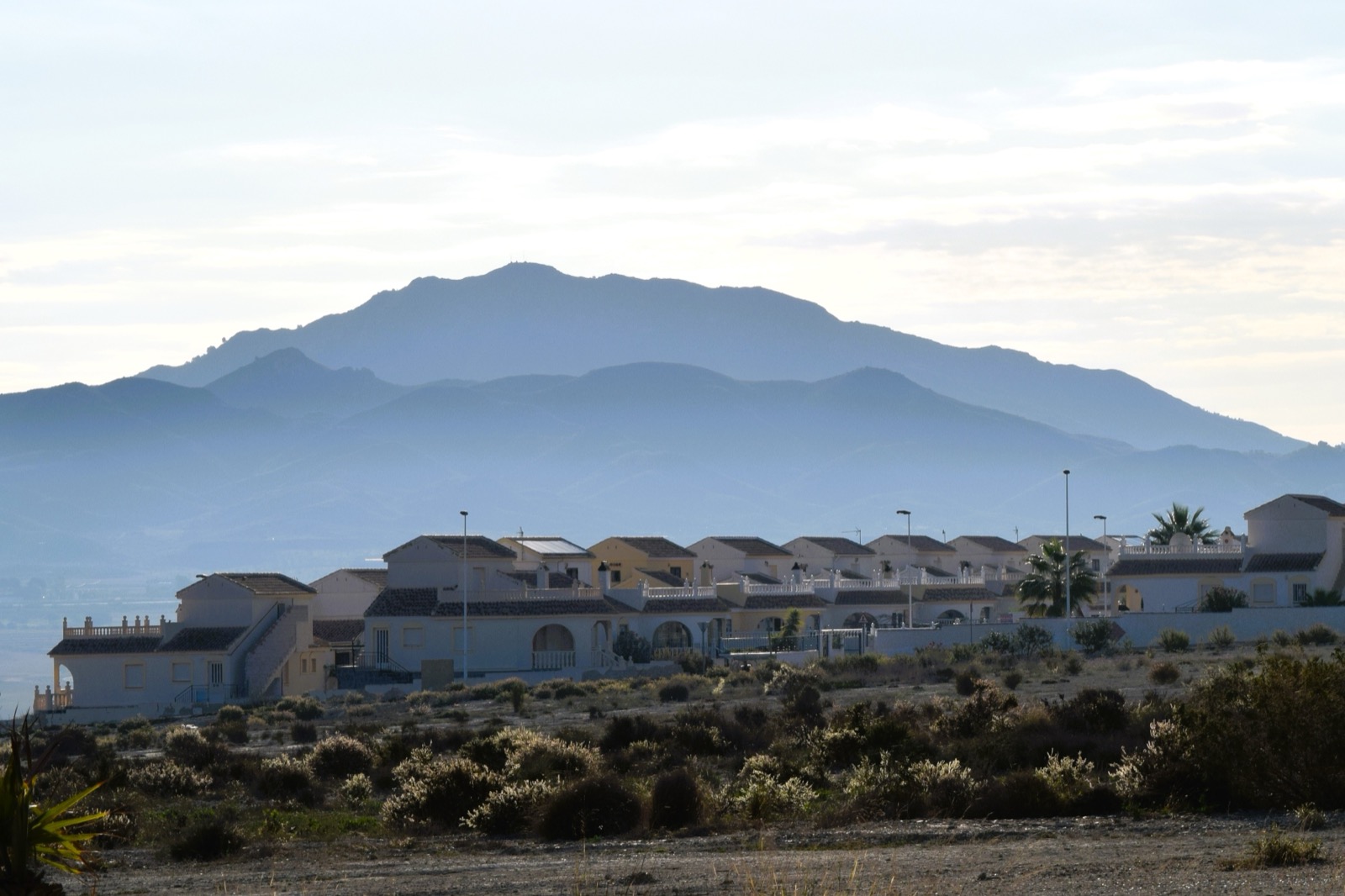 Villas in the Upper C sector of Camposol with the mountains behind